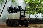 XAG_R200_agricultural_rover_performs_precision_spraying_a_vineyard.jpg
